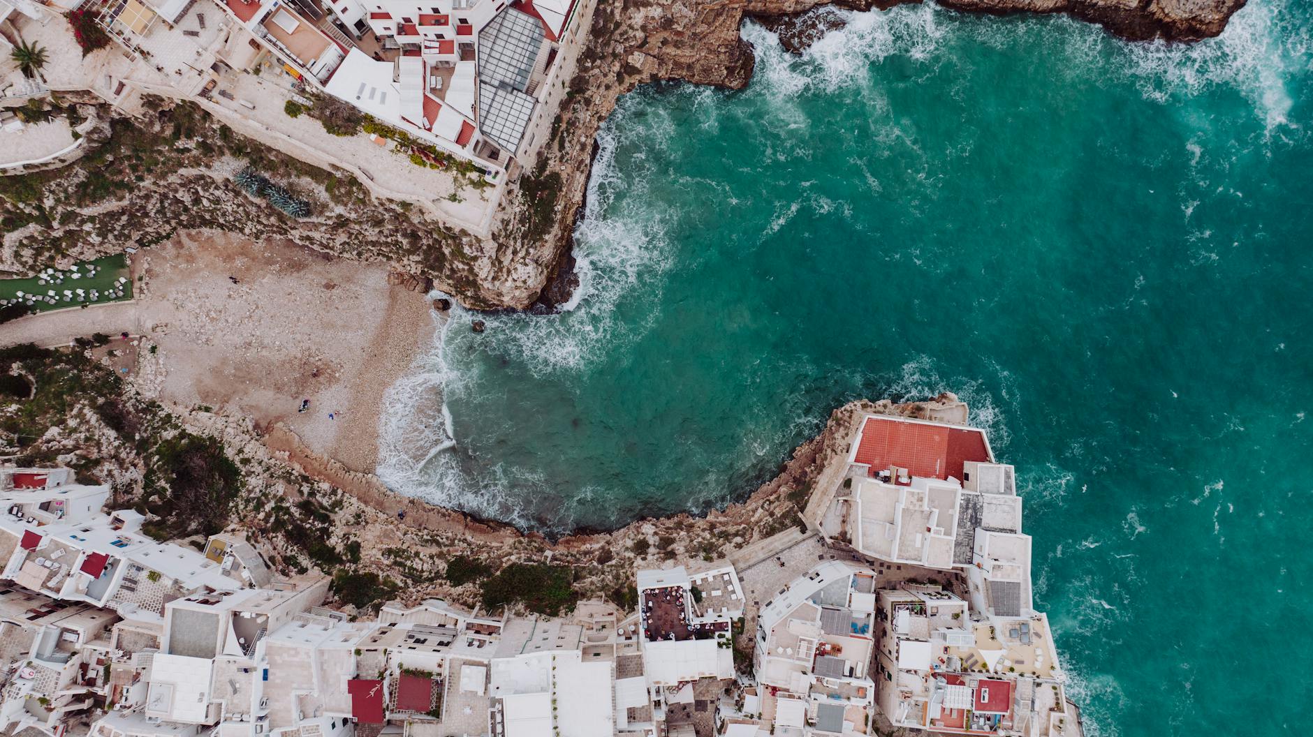 aerial photo of a bay in a seaside town